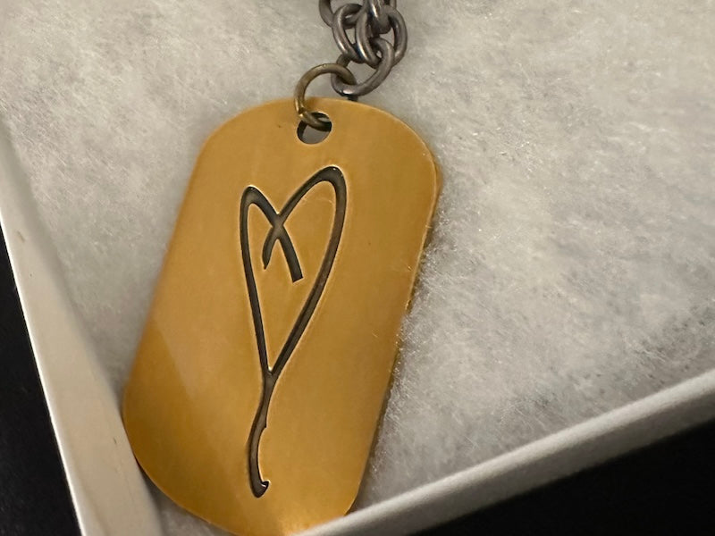 Eartha Kitt's Hand drawn heart dog tag