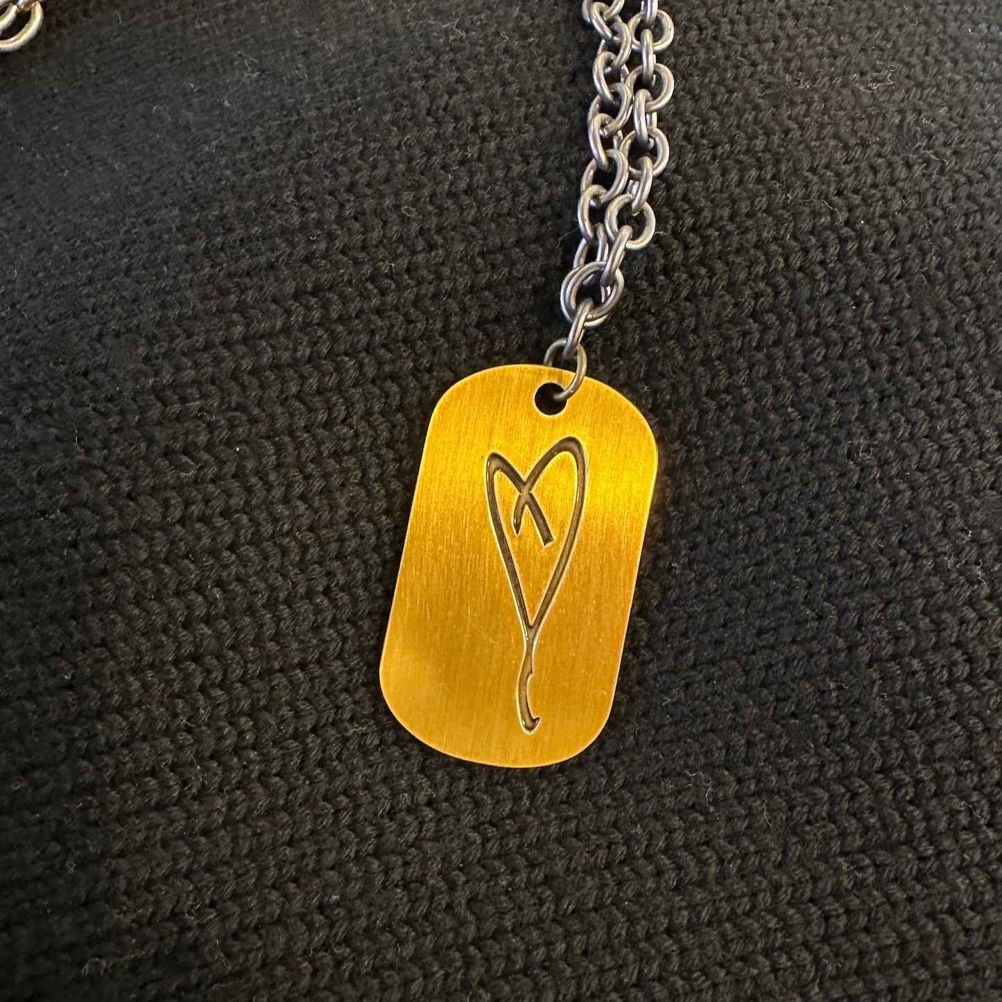 Eartha Kitt's hand drawn heart dog tag necklace in antique gold and oxidized silver chain at simplyeartha.com